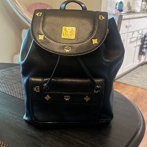MCM Black Backpack with Gold Details